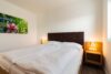3-Zi.-Penthouse am Golfplatz – mit Naturteich und neben Therme - Schlafzimmer 1