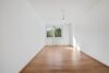 WO WIEN INS GRÜNE ÜBERGEHT. Drei Zimmer, 17 m² Südostbalkon und moderner Wohnkomfort. - Bild
